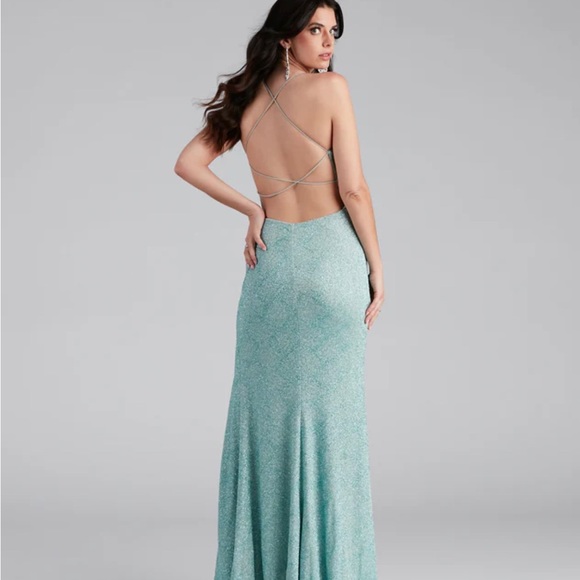 This is a formal gown from Windsor, it is in the color “Sea Foam” and a size XS. - Picture 2 of 2